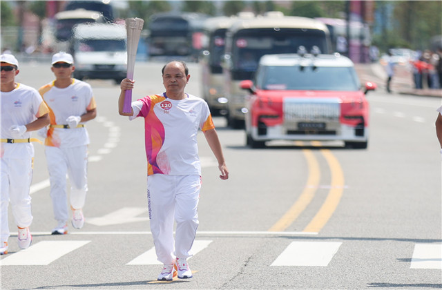 亚运火炬手韦晓青：参与“大莲花”建设，传递火炬一生难忘